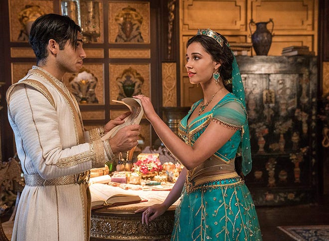 Mena Massoud plays Aladdin and Naomi Scott portrays Prince Jasmine in the new live-action adaptation of the classic Disney movie. [WALT DISNEY PICTURES]