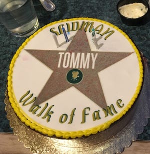 A 70th birthday cake for columnist Carrie Seidman's brother, Tom, gave the film industry veteran his long-awaited star on the Hollywood Walk of Fame. [Herald Tribune Staff Photo/ Carrie Seidman]