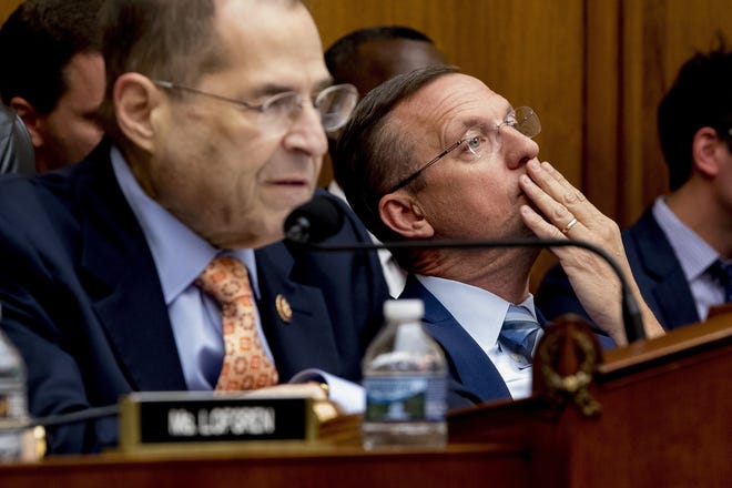 Ranking Member Rep. Doug Collins, R-Ga., right, listens as Judiciary Committee Chairman Jerrold Nadler, D-N.Y., left, speaks at a House Judiciary Committee hearing without former White House Counsel Don McGahn, who was a key figure in special counsel Robert Mueller's investigation, on Capitol Hill in Washington Tuesday. [AP Photo/Andrew Harnik]