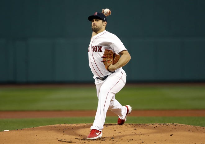 Red Sox starting pitcher Nathan Eovaldi delivers a pitch in a game earlier this season. Eovaldi threw 35 pitches to the bullpen catcher on Tuesday in his first real action since undergoing arthroscopic surgery to remove loose bodies from the joint in late April. [AP File Photo/Winslow Townson]