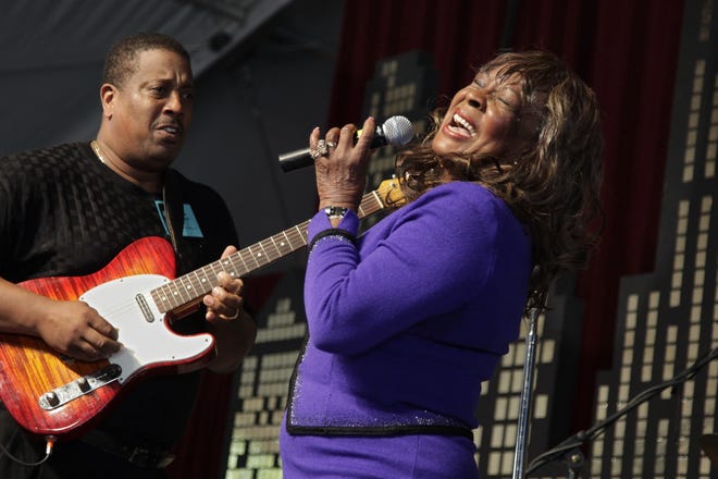 FILE - In this July 1, 2011, file photo, Martha Reeves, of "Martha Reeves and the Vandellas," performs at the The Smithsonian Folklife Festival's Rhythm and Blues pavilion on the National Mall in Washington. When Motown legend Reeves sings her 1964 hit "Dancing in the Street" in the Alabama House of Representatives, let the record show that lawmakers feel compelled to sing along. Reeves, a native of Eufaula, Alabama, led lawmakers in song Wednesday, May 22, 2019. (AP Photo/J. Scott Applewhite, File)
