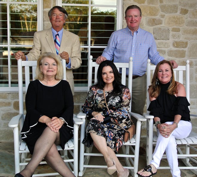Janet Westling (seated from left) chaired the annual Art and House Tour for the Cultural Center at Ponte Vedra Beach. With Westling are board president Art Hayden (standing left), center executive director Donna Guzzo and home owners Brad and Joy Scott, who opened their home for a benefactor reception. [JACKIE ROONEY/FOR SHORELINES]