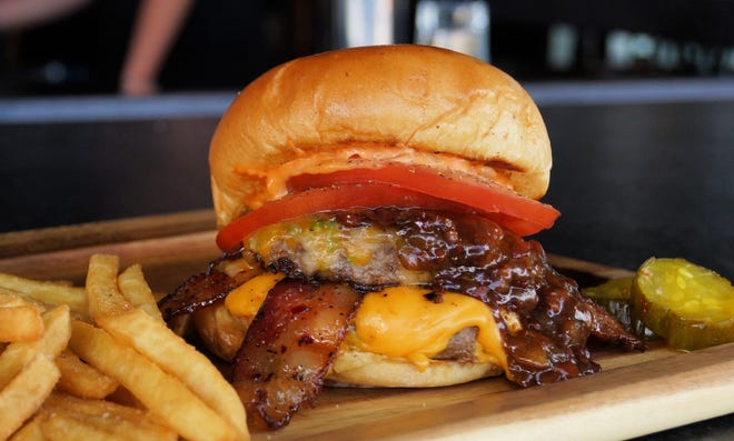 The Double Double burger at Oak & Stone. [Courtesy photo]