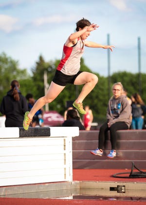 Canandaigua Academy senior Katie Cobos won the Section V Class A steeplechase championship on Friday at South Seneca. [Dianna Hart/Messenger Post Freelancer]