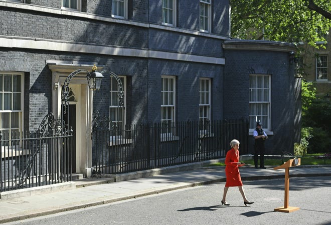 Britain's Prime Minister Theresa May arrives to make a statement outside at 10 Downing Street in London, Friday May 24, 2019. Theresa May says she'll quit as UK Conservative leader on June 7, sparking contest for Britain's next prime minister. (Dominic Lipinski/PA via AP)