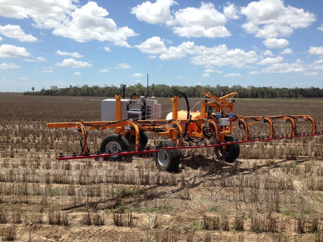 A SwarmFarm robot spraying on a farm in Australia. [Bloomberg / David Stringer]
