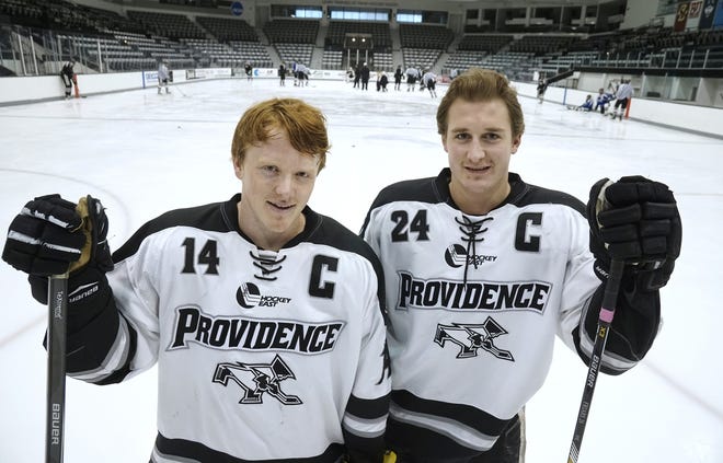 Noel Acciari, right, and fellow Providence College captain Ross Mauermann at Schneider Arena in 2015. [The Providence Journal, file / Kris Craig]