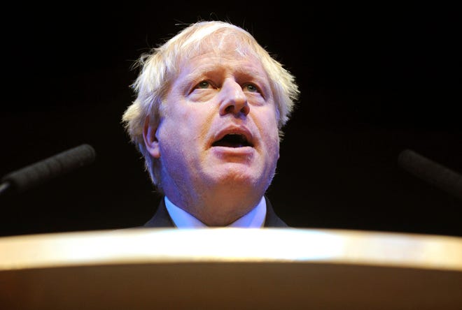 FILE - In this Tuesday, Oct. 2, 2018 file photo, British Conservative Party Member of Parliament Boris Johnson speaks at a fringe event during the Conservative Party annual conference at the International Convention Centre, in Birmingham, England. Prime Minister Theresa May’s announcement that she will leave 10 Downing Street has set off a fierce competition to succeed her as Conservative Party leader _ and as the next prime minister. (AP Photo/Rui Vieira, File)