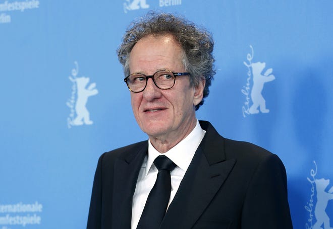 FILE - In this Feb. 12, 2013 file photo, actor Geoffrey Rush poses at the photo call for the film The Best Offer at the 63rd edition of the Berlinale, International Film Festival in Berlin. (AP Photo/Michael Sohn, File)