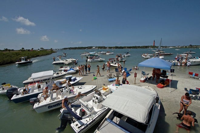 Hundreds of boaters gather at Disappearing Island on weekends. [News-Journal file]