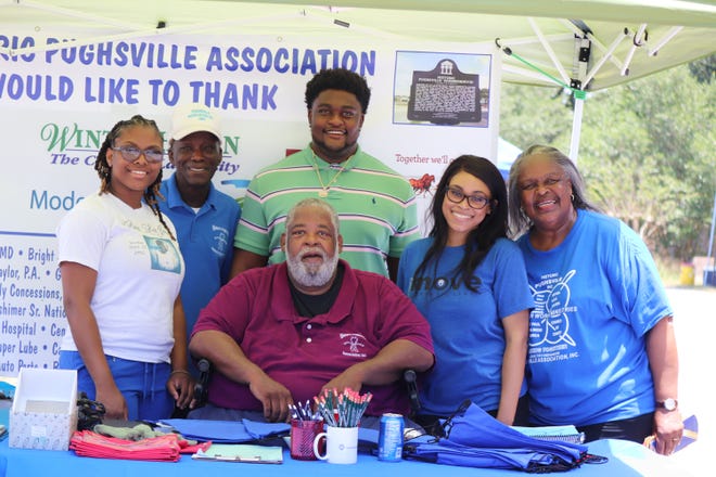 Historic Pughsville Association Inc. members pose with this year's scholarship winners at the annual May Day celebration held Saturday at Zion Hill Missionary Baptist Church in Winter Haven. From left: Turiana Riley, Robert Atkins, Grayson Long, Lauren Smith, Russell Burney (association president), and Beulah Harvey Clark. [KATHY LEIGH BERKOWITZ/THE LEDGER]