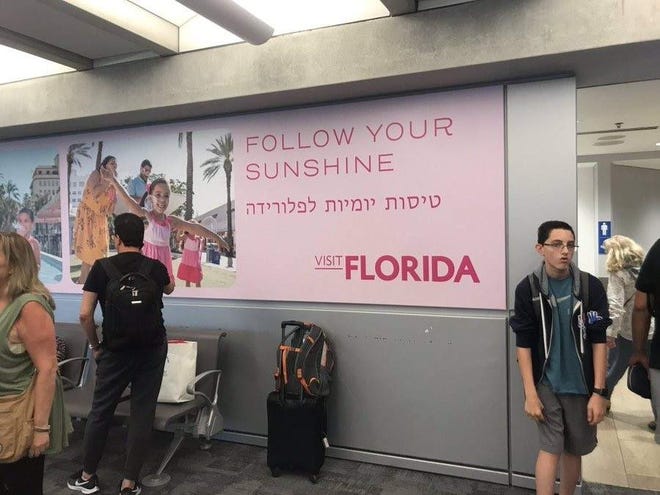 A Visit Florida ad was the first thing to greet the Florida delegation to Israel as they disembarked in Tel Aviv after a 12 hour flight.
