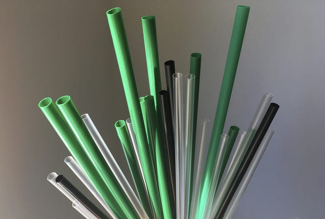 Plastic drinking straws are photographed. [AP Photo/Barbara Woike, File]