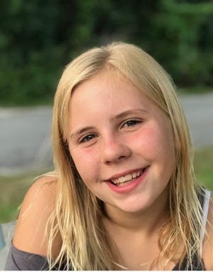 Abigail Bajek, 11, of Minneola, was bitten in the left foot by a pygmy rattler on Sunday at Blue Spring State Park in Orange City, her mother said. [Kelly Bajek]