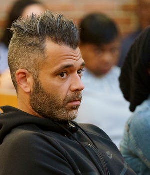 Mark D'Amico sits in Burlington City Municipal Court where he appeared regarding citations for driving with a suspended license, in Burlington City on Tuesday, Sept. 18, 2018. D'Amico, under investigation over more than $400,000 raised online for a good Samaritan, says everything in the case will become “crystal clear.” D’Amico appeared in court Tuesday on unrelated traffic charges. [Jessica Griffin/The Philadelphia Inquirer via AP, Pool]