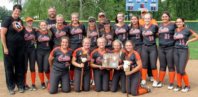 Meadowbrook High's softball team poses with its Division III regional championship hardware after defeating Fairfield High, 7-5 in a nine-inning thriller on Saturday at Lancaster High School.