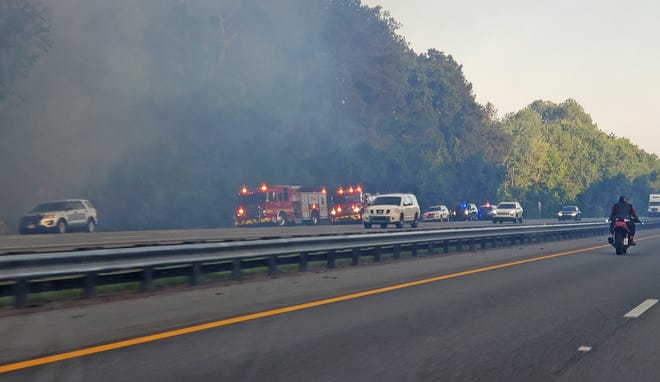 Smoke from the Yellow Bluff fire began blanketing Interstate 95 north of Pecan Park Road last Wednesday afternoon as area fire crews responded to battle it. The state shut the interstate down in that area again Tuesday. [Dan Scanlan/Florida Times-Union]