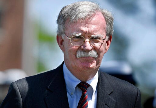 National Security Adviser John Bolton arrives to speak at the commencement for the United States Coast Guard Academy in New London, Conn., Wednesday, May 22, 2019. (AP Photo/Jessica Hill)