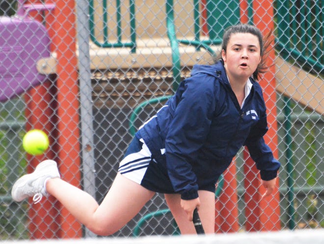 St. Thomas freshman Katie Carignan serves at No. 1 singles during Fridayís 5-4 win over Conant in the Division III girls tennis semifinals. The Saints meet No. 2 Littleton Wednesday for the state title in Derry. [Mike Whaley/Fosters.com]