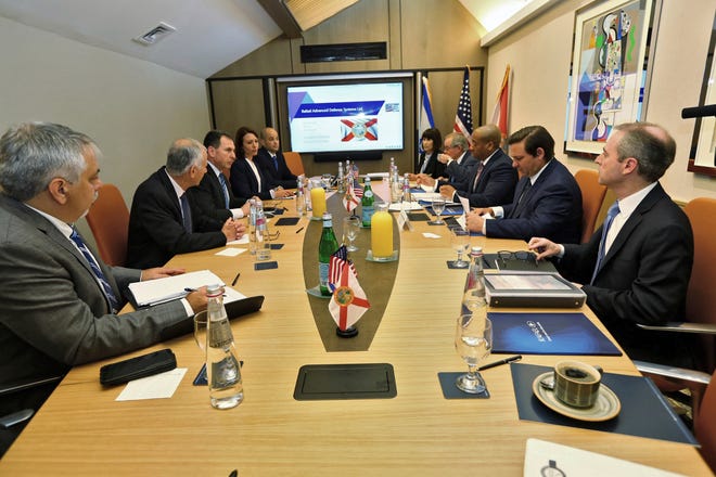 Gov. Ron DeSantis, second from right, meets with representatives of Rafael, a military and defense technologies development firm, during a trade visit to Israel on Monday. DeSantis is leading a delegation on a four-day trade mission to help boost the state's economy and solidify its bonds with Israel. [Jeff Schweers/Tallahassee Democrat via AP]