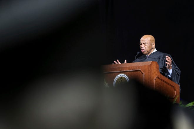 Civil rights icon and U.S. Rep. John Lewis delivers the commencement address during the Framingham State University's undergraduate commencement ceremony at the DCU Center in Worcester, Mass., on Sunday, May 26, 2019. (Dan Holmes/The Metro West Daily News via AP)