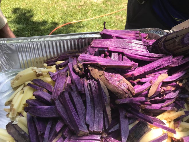 Some of the colorful locally-grown potatoes ready to be made into French fries at the Bunnell Bonanza. [Photo provided/Wendy Mussoline]