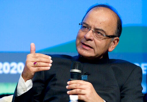 FILE- In this Oct. 7, 2016 file photo, India Finance Minister Arun Jaitley speaks during a panel discussion at the World Bank/IMF Annual Meetings at IMF headquarters in Washington. Jaitley, who carried out Prime Minister Narendra Modi's economic initiatives including tax and welfare reforms, has decided not to join Modi's new government to be sworn in Thursday, citing health reasons. (AP Photo/Jose Luis Magana, File)