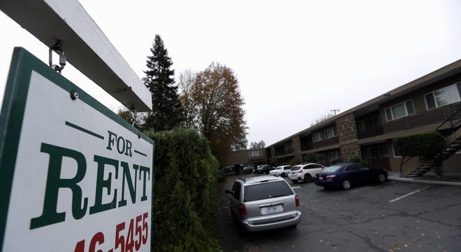 A "for rent" sign is shown outside an apartment complex. [AP FILE PHOTO BY DON RYAN]