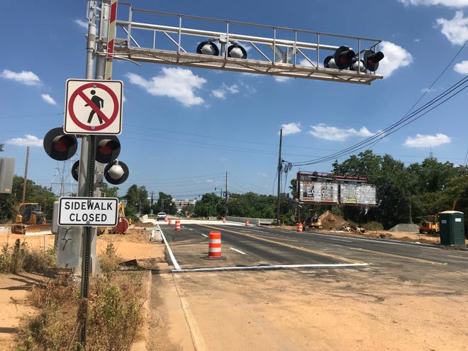 The Broad Street bridge over Hawks Gully reopened Thursday after being closed for many months for repair and restoration. [SUSAN MCCORD/THE AUGUSTA CHRONICLE]