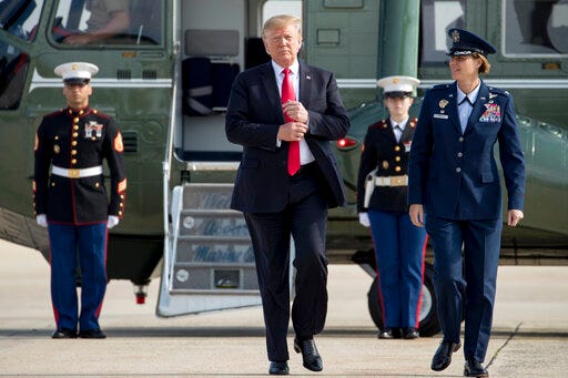 President Donald Trump walks across the tarmac to board Air Force One at Andrews Air Force Base, Md., Thursday, May 30, 2019, to travel to Peterson Air Force Base, Colo., to attend the 2019 United States Air Force Academy Graduation Ceremony United States Air Force Academy. (AP Photo/Andrew Harnik)