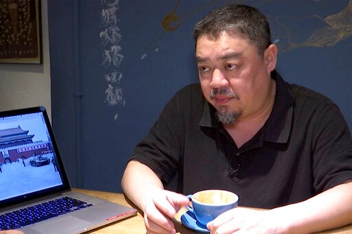 In this image taken from video footage shot on May 22, 2019, Wu'er Kaixi speaks during an interview in Taipei, Taiwan. Wu'er was among the most outspoken of the student leaders during the 1989 Tiananmen Square pro-democracy protests, famously reproaching then-Premier Li Peng at a meeting broadcast on national television. (AP Photo)