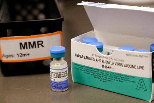 FILE - This May 15, 2019 file photo shows a vial of a measles, mumps and rubella vaccine at a clinic in Vashon Island, Wash. On Thursday, May 30, 2019, U.S. health officials reported this year’s U.S. measles epidemic surpassed a 25-year-old record, and experts say it’s not clear when the wave of illnesses will stop. There were 971 cases so far this year, eclipsing the 963 measles illnesses reported for all of 1994. (AP Photo/Elaine Thompson, File)