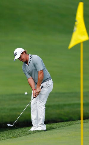 Bud Cauley chips to the ninth green during the first round of the Memorial golf tournament Thursday, May 30, 2019, in Dublin, Ohio. (AP Photo/Jay LaPrete)