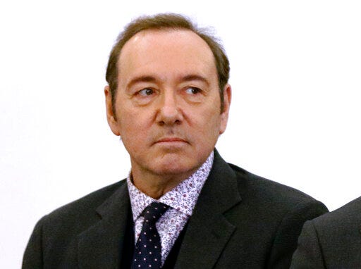 FILE - In this Jan. 7, 2019 file photo, actor Kevin Spacey stands in district court during arraignment on a charge of indecent assault and battery in Nantucket, Mass. The Oscar-winning actor is accused of groping the teenage son of a former Boston TV anchor in the crowded bar at the Club Car Restaurant in 2016. On Thursday, May 30, Nantucket District Court Judge Thomas Barrett ruled that the restaurant must hand over any surveillance footage taken there on the night in question. (Nicole Harnishfeger/The Inquirer and Mirror via AP, Pool, File)