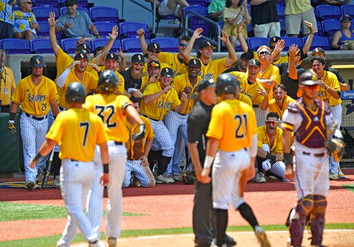 The Southern Miss dugout reacts after Matt Wallner's (32) three-run home run in the fifth inning against Arizona State during the NCAA college baseball regional tournament, Friday, May 31, 2019, in Baton Rouge, La. (Hilary Scheinuk/The Advocate via AP)