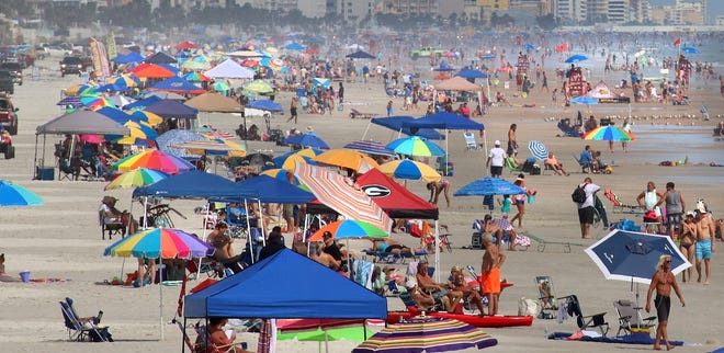 The beach at Daytona Beach at the very height of ultra-summer last year. [News-Journal/Jim Tiller]