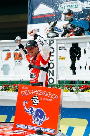 Cole Custer celebrates in Victory Lane after winning the NASCAR Xfinity Series auto race at Pocono Raceway, Saturday, June 1, 2019, in Long Pond, Pa. (AP Photo/Matt Slocum)
