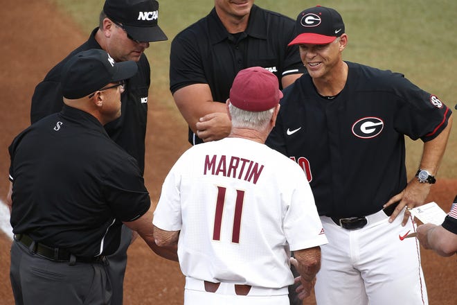 Georgia coach Scott Stricklin shakes hands with Florida State coach Mike Martin (11) before their NCAA baseball tournament game on Saturday in Athens, Ga. ([oshua L. Jones/Athens Banner-Herald]