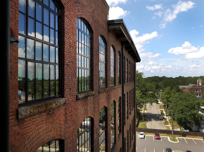 Ninety years after the historic Loray Mill strike, the site is a thriving residential and commerical site in the heart of western Gastonia. And plans are underway for more residential growth [JOHN CLARK/THE GASTON GAZETTE]