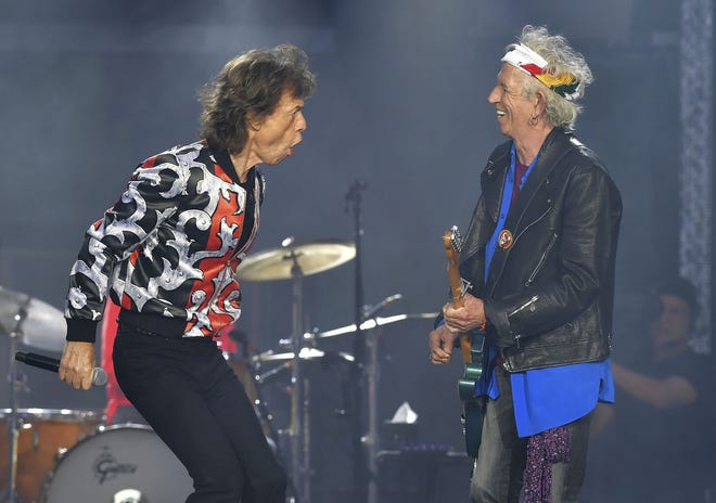 Mick Jagger and Keith Richards perform May 25 in London during The Rolling Stones' No Filter tour, which comes to Gillette Stadium in Foxboro July 7. [The Associated Press]