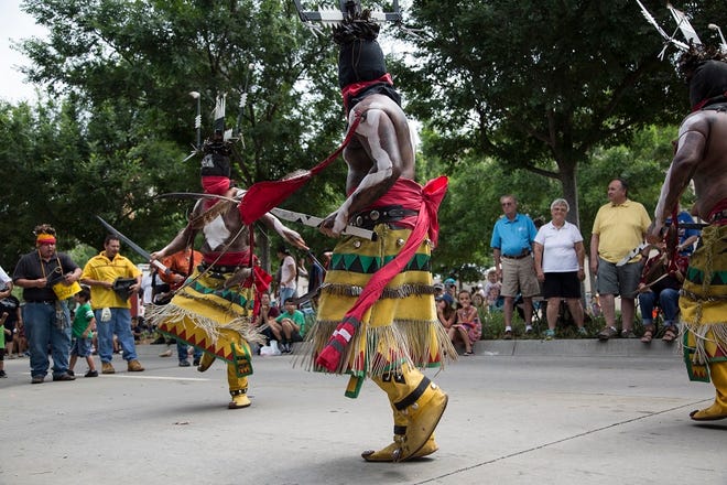 Apache Crown Dancers participate in the 2018 Red Earth Festival parade, which celebrates Native American culture, in Oklahoma City, Friday, June 8, 2018. [The Oklahoman Archives photo]