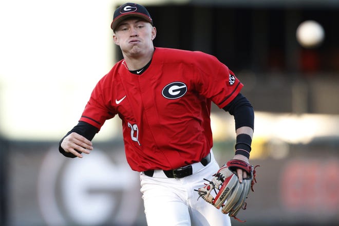 Georgia's Aaron Schunk (22) throws the ball to first during an NCAA college baseball game against Alabama State, Tuesday, March 5, 2019 in Athens. [Photo/Joshua L. Jones, Athens Banner-Herald]