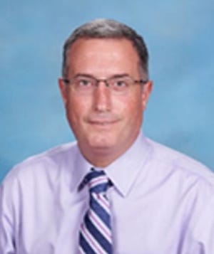 Michael Comeau has resigned his post at Holy Family School. [HOLY FAMILY SCHOOL]