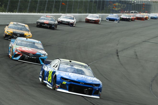 The field in the NASCAR Cup Series race at Pocono Raceway on Sunday remained single file throughout the majority of the race with minimal passing. [AP PHOTO/MATT SLOCUM]