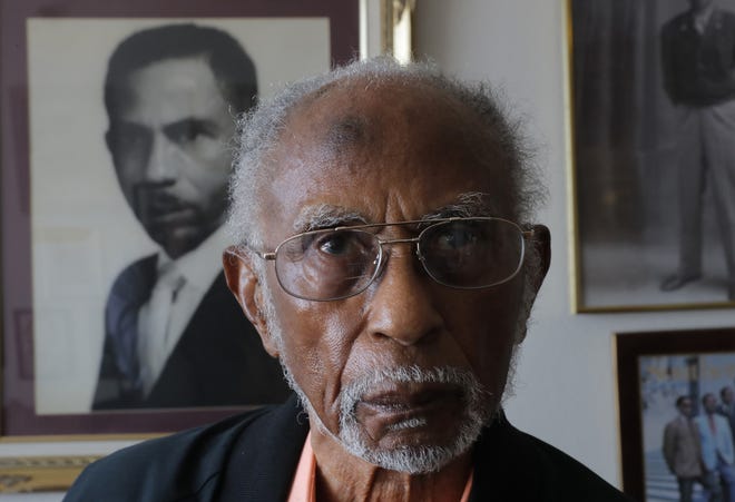 World War II veteran Johnnie Jones Sr. poses for a portrait at his home in Baton Rouge, La., on May 28. Jones, who joined the military in 1943 out of Southern University in Baton Rouge, was a warrant officer in a unit responsible for unloading equipment and supplies onto Normandy. [AP Photo/Gerald Herbert]