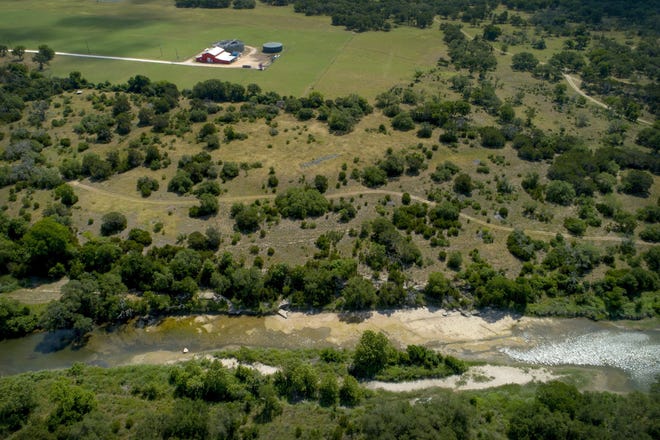 An Austin water watchdog group is trying to stop the state's environmental agency from allowing the city of Drippings Springs to release treated wastewater into Onion Creek, a waterway that feeds the Barton Springs portion of the Edwards Aquifer. [JAY JANNER / AMERICAN-STATESMAN]