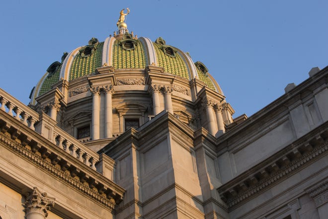 Pennsylvania state representatives voted 195-0 on Wednesday to send a proposed ban on marriages involving parties under the age of 18 to the Senate. [Matt Rourke / Associated Press file]