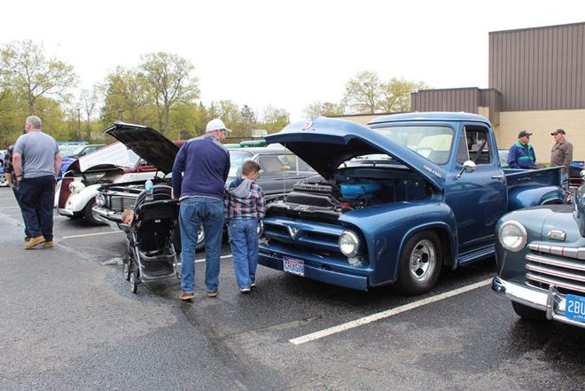 One of the first things everyone noticed as they were coming to the third annual Business Expo in Indian River was the car show in the north parking lot, put on by Northern Rods 'n' Rides. A lot of families walked through the show, with the parents explaining to the kids about the older model cars.