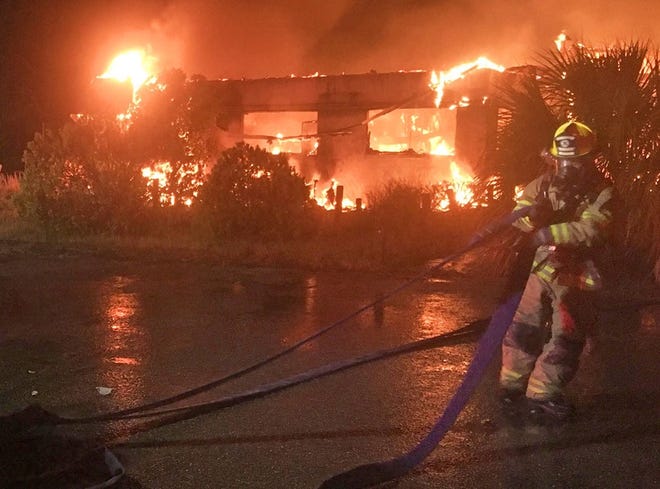 Firefighters from Fernandina Beach and Nassau County work to extinguish a blaze at the former county Juvenile Residential Facility. [Fernandina Beach Fire Department]