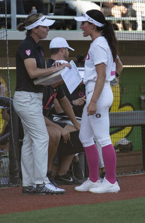 Oregon pitcher Jordan Dail (right) was the only scholarship pitcher first-year coach Melyssa Lombardi had on the roster most of the season. [Zach Wilkinson/For The Register-Guard] - registerguard.com